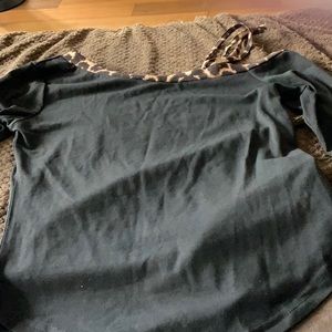 Black top with leopard border and shoulder strap with leopard print